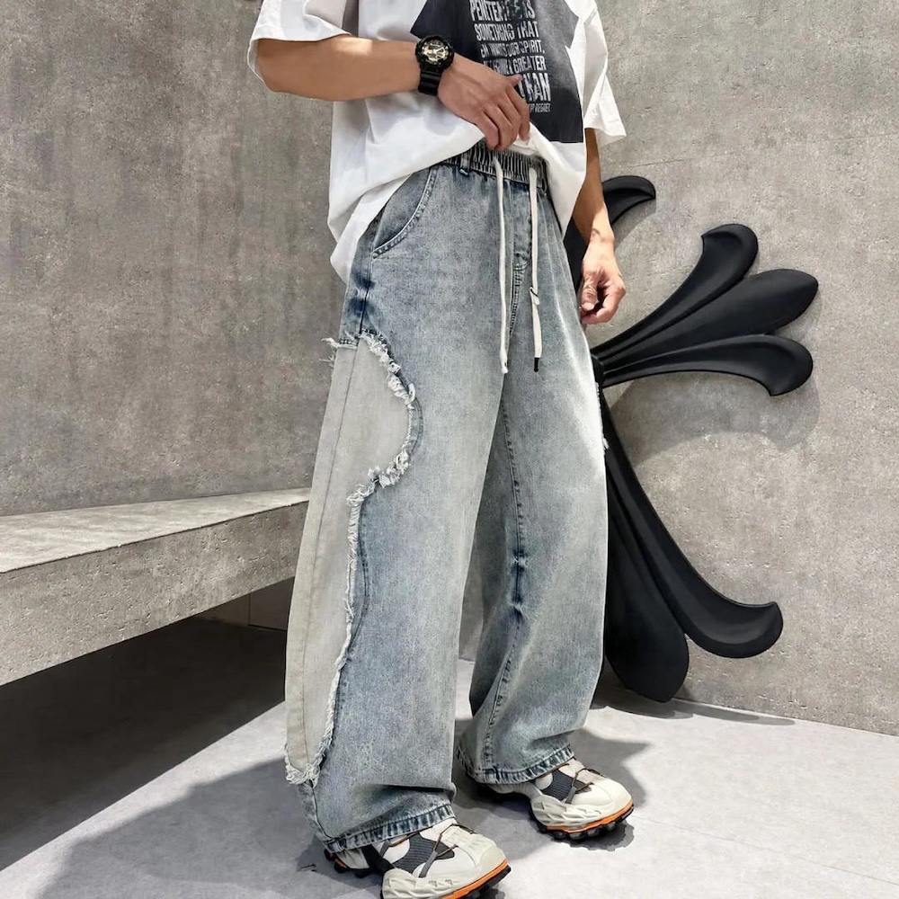 AMERO 愛馬歐 男女同款 牛仔褲 抽鬚拚接 造型 水洗 彎刀褲