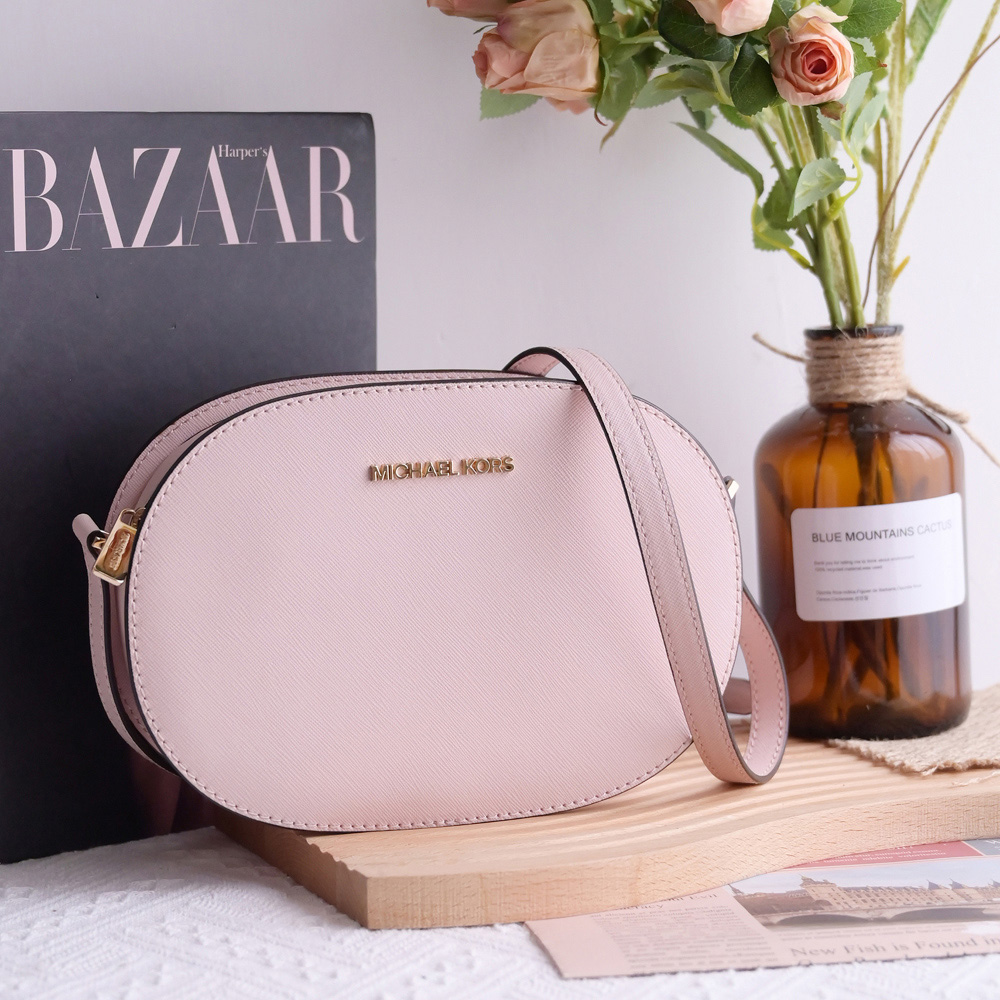 Michael Kors JET SET TRAVEL防刮拉鍊斜背包.粉